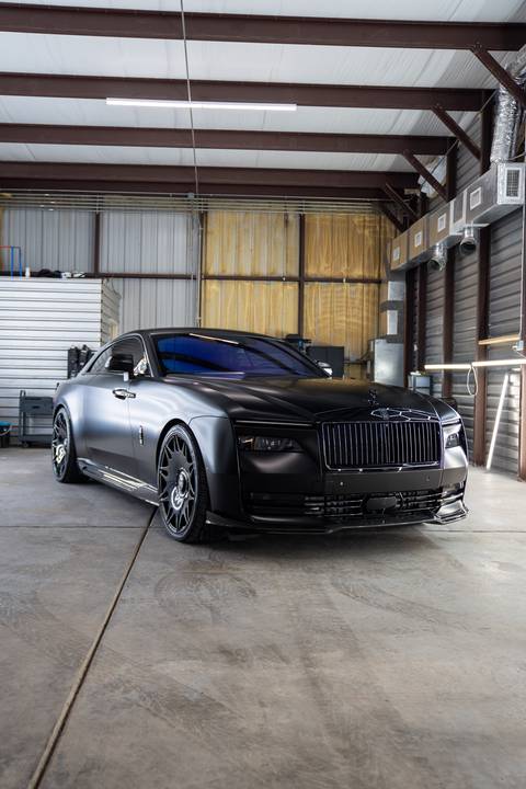 Rolls-Royce in satin black finish after ceramic coating in our Lubbock TX shop