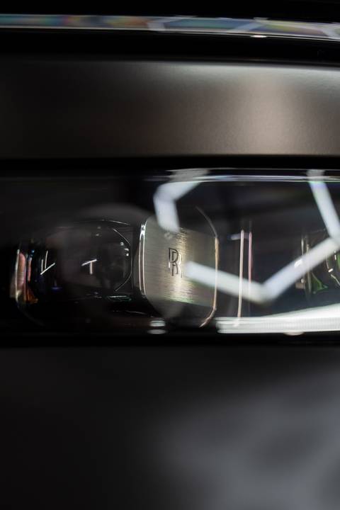 Rolls-Royce headlight detail after decontamination and coating